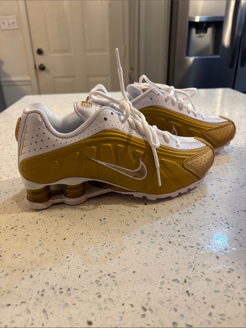 Nike Kids White and Gold Athletic Sneakers with Shox